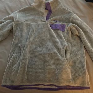 Size medium Patagonia crew neck gray with purple detail pockets too
